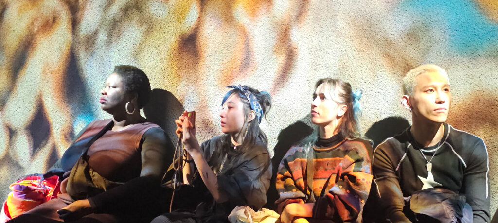 A group of visitors, including Marta Pang watches the live AV performance by OVAL and MXZEHN at the NODE Gallery Night Robert Seidel at Studio1111, Berlin